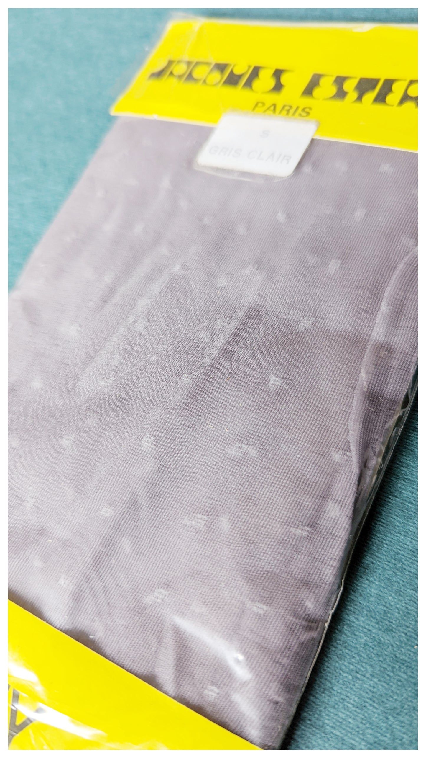 Bas collant gris clair à pois 70s