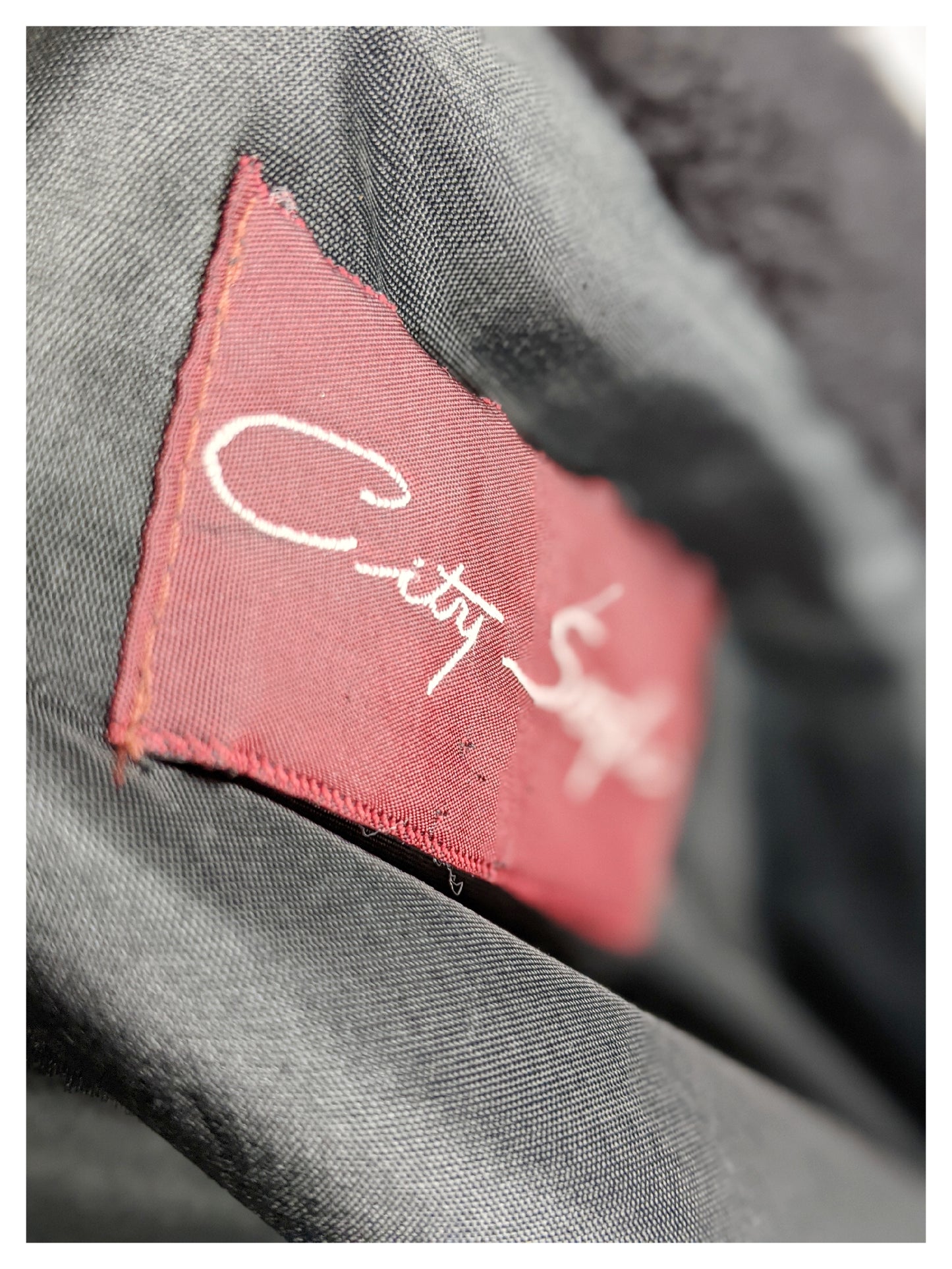 Manteau fausse fourrure noire 80's